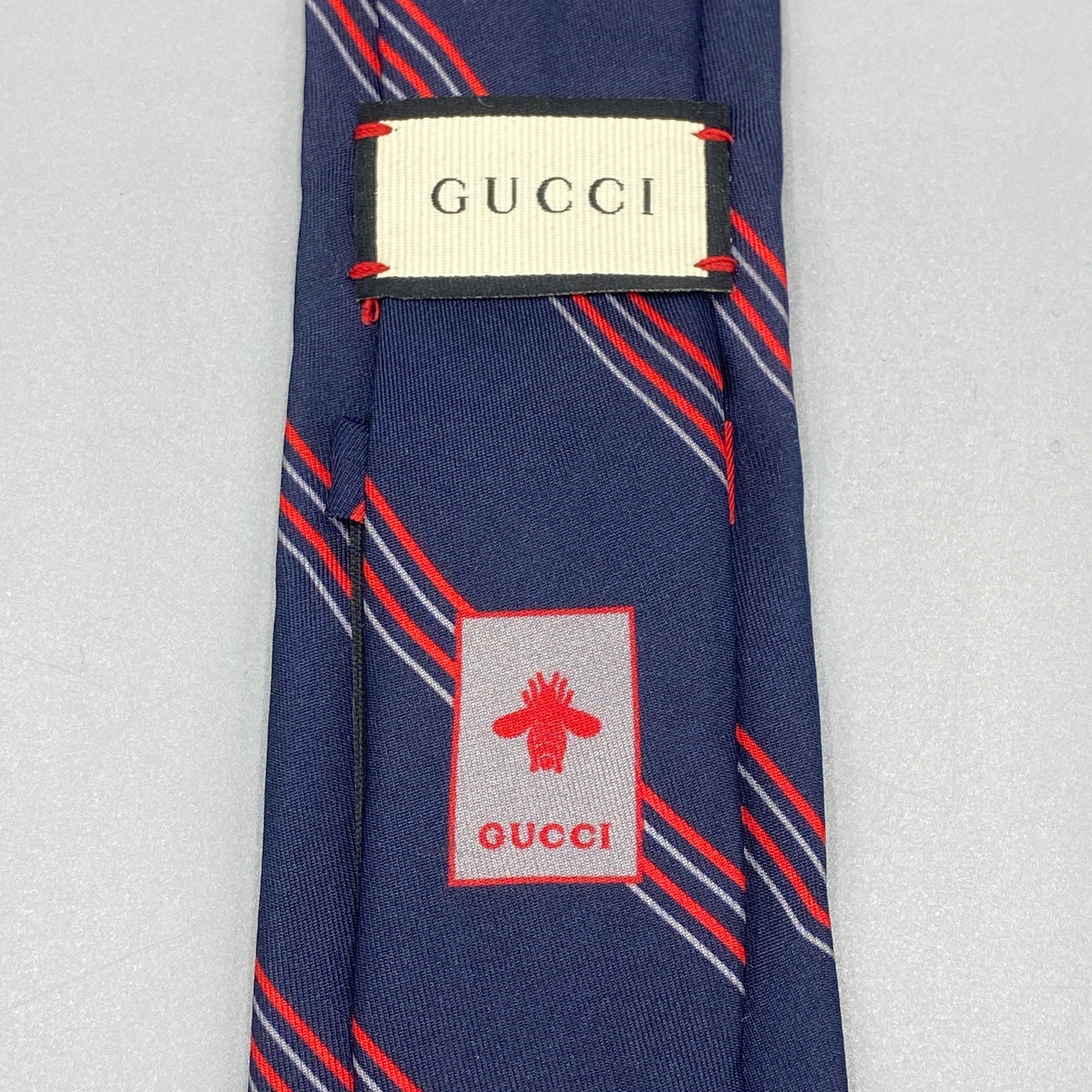 Cravate à rayures Gucci
